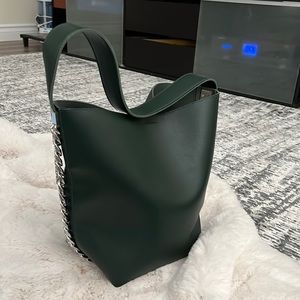 Green bucket bag with chains